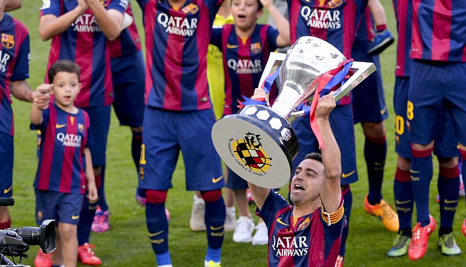 El Barcelona se proclama campeón de liga tras ganar al Granada 3-0 en los Cármenes.